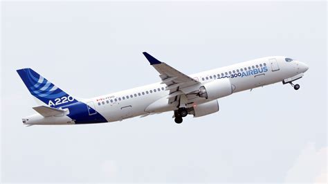 Airbus A220 operating long thin route service between secondary cities at sunset