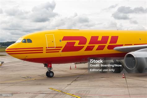 Airbus A300-600F DHL cargo freighter loading containers European express hub