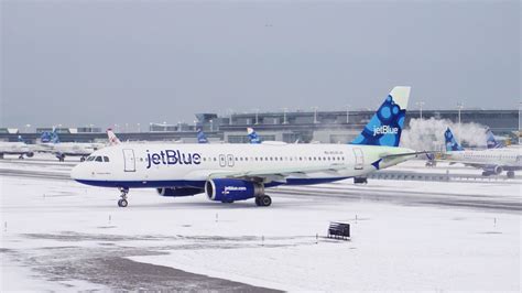 Airbus A320 single engine taxiing at airport taxiway after landing