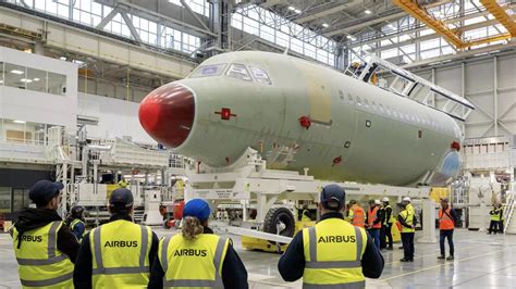 Airbus A320neo production line with unfinished aircraft awaiting engines