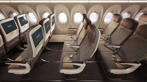 Airbus A321 economy cabin showing overhead bins and mid-cabin seating area