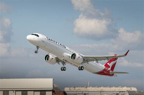 airbus a321xlr taking off at sunset with extended range fuel tanks visible