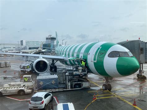 Airbus A330neo parked at airport gate during airline fleet operations
