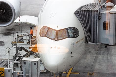 Airbus A350-1000 parked at gate carbon fiber fuselage widebody