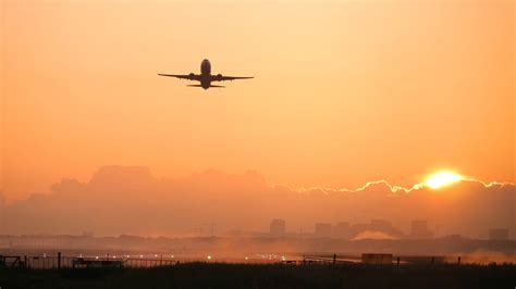 Airbus A350-900 taking off at sunrise