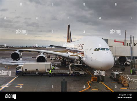 Airbus A380 Heathrow airport boarding passengers double deck
