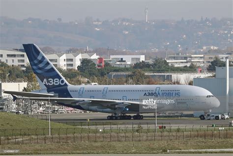 Airbus A380 maiden flight over Toulouse with landing gear extended