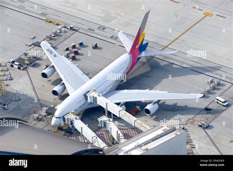 airbus a380 parked at singapore changi terminal with jet bridge