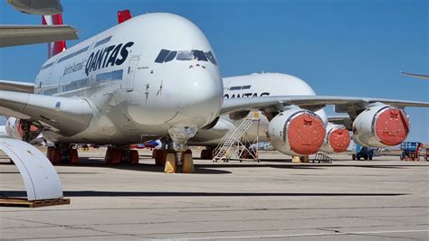 Airbus A380 stored at desert facility with engines covered during industry downturn