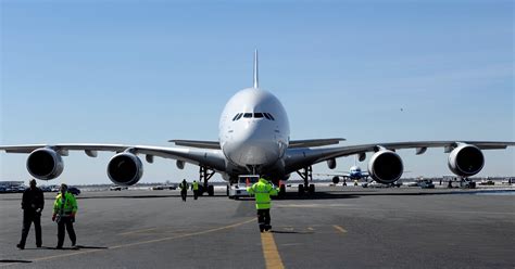 airbus a380 taxiing on reinforced airport runway with gate modifications