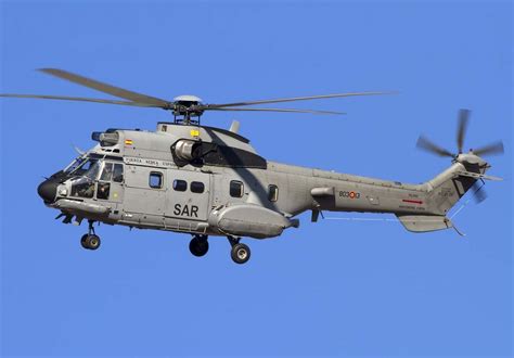 airbus as332 super puma approaching offshore oil platform