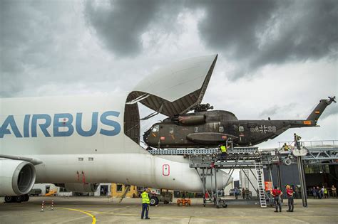Airbus Beluga XL parked at Airbus factory loading oversized wing components