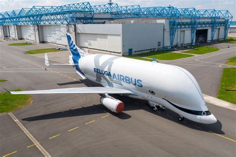 Airbus Beluga XL unloading wing components at Toulouse airport