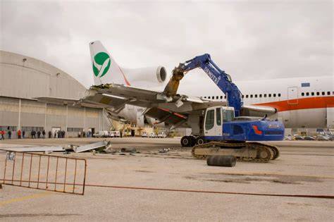 aircraft dismantling facility removing Boeing 777 engines and aviation components