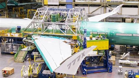 aircraft engines lined up in factory awaiting installation Boeing production delay