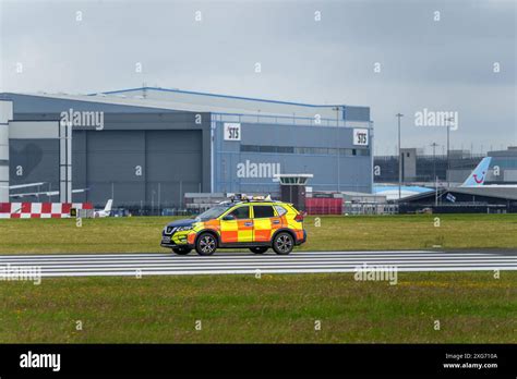 airfield ops vehicle inspecting runway at class C airport
