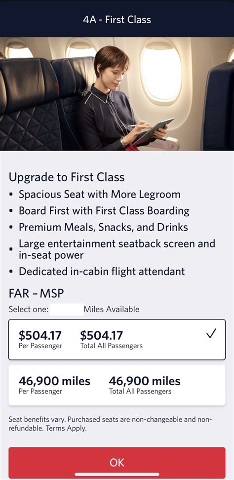 airline gate agent reviewing digital first class upgrade list
