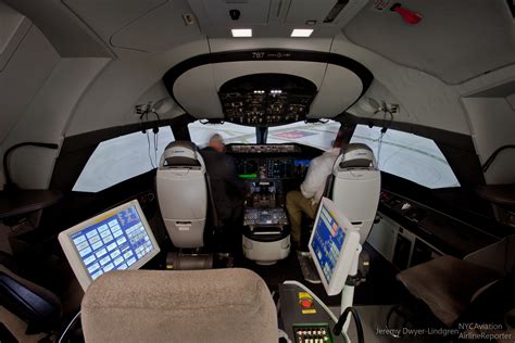 airline pilots training inside Boeing 787 flight simulator