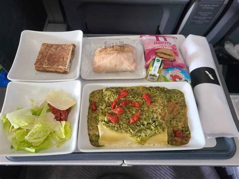 airline premium economy meal service plated food inflight tray
