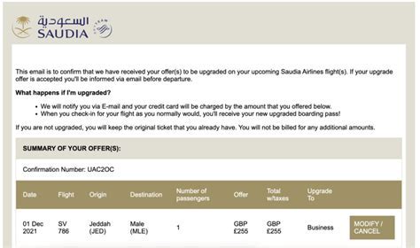 airline upgrade bidding screen laptop passenger submitting bid for business class