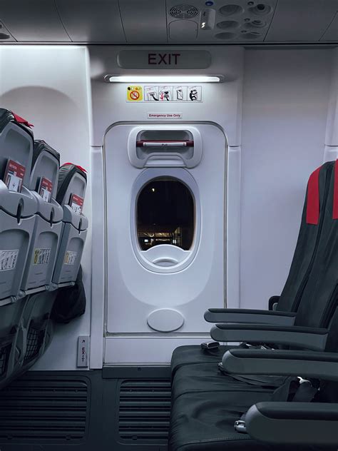 airplane cabin evacuation drill narrowbody aircraft aisle access passengers