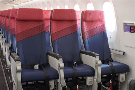 airplane economy cabin narrow seating rows