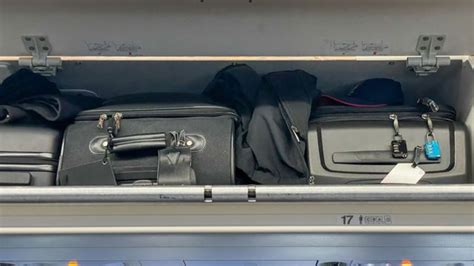 airplane overhead bin organization passengers boarding process