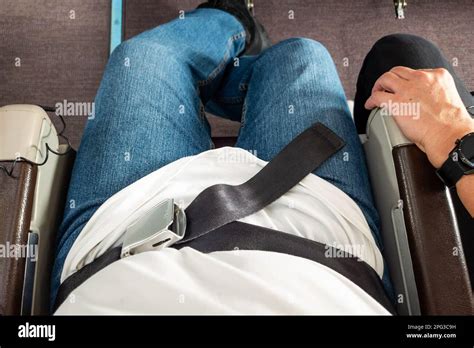 airplane seat belt fastened passenger safety