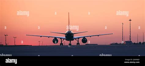 airplane taxiing empty runway dawn minimal traffic aviation operations mood