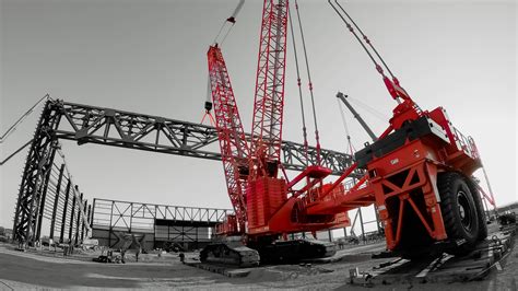 airport construction site at SAV with cranes and expansion work underway