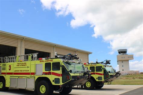 airport emergency response vehicles near commercial aircraft during precautionary landing