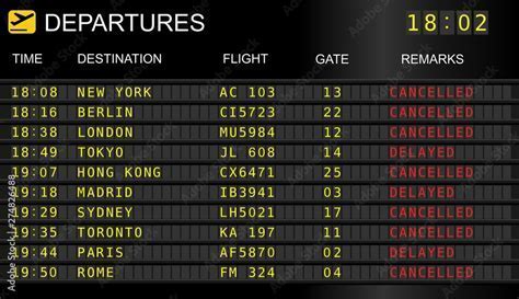 Airport flight departure board displaying a delayed Spirit Airlines flight