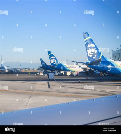Alaska Airlines and Delta Air Lines aircraft at Seattle Tacoma International Airport gates