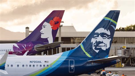 alaska airlines dreamliner over rome skyline at sunset