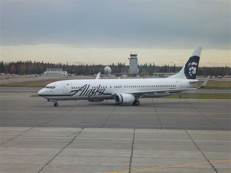 alaska airlines flight boarding at Fairbanks International Airport during winter