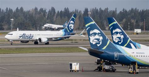 alaska airlines flight boarding delayed announcement at seattle airport