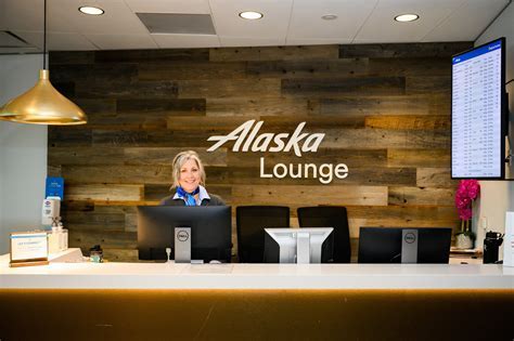 alaska airlines lounge signage at los angeles international airport