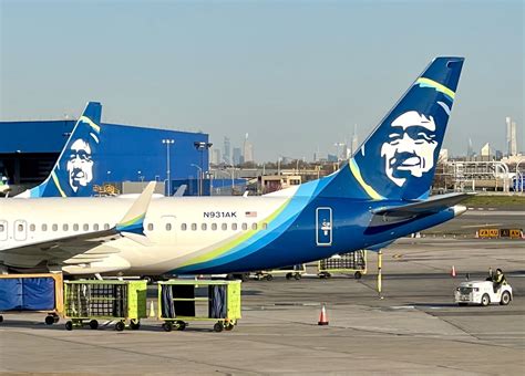 alaska airlines mileage plan award flight confirmation on mobile app screen