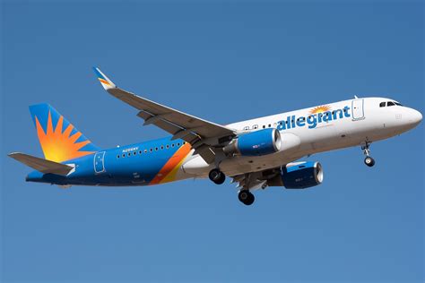 allegiant air aircraft boarding at secondary airport