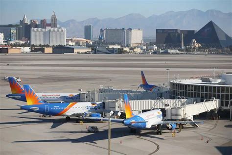 allegiant aircraft taking off near las vegas desert backdrop