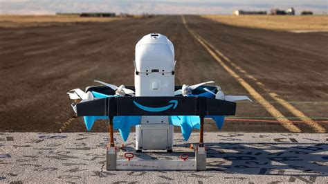 amazon drone landing at rural house for package delivery