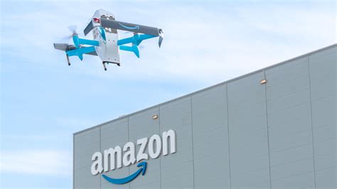 Amazon Prime Air MK30 drone completing successful delivery drop in suburban neighborhood