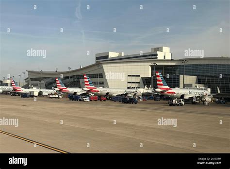 American Airlines aircraft lined up at DFW gates post-Delta withdrawal