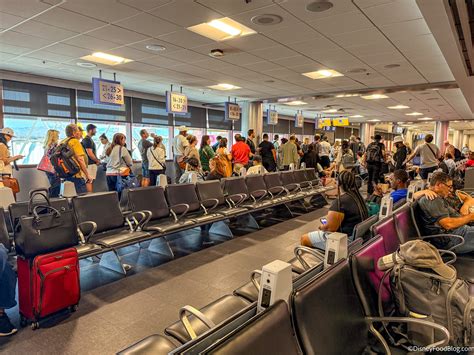 American Airlines airport gate boarding area with elite passengers