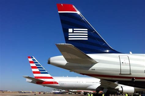 American Airlines and US Airways planes side-by-side during merger transition