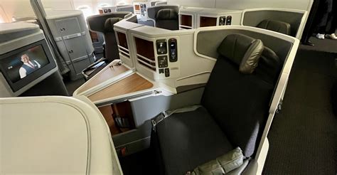 american airlines boeing 777 preparing for takeoff with emphasis on business class cabin