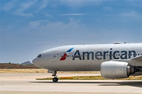 american airlines boeing 787-9 taxiing for takeoff to auckland at dfw airport