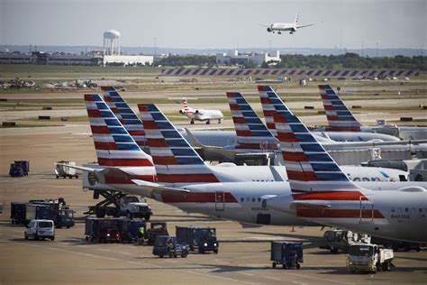 American Airlines Boeing aircraft at Dallas Fort Worth International Airport terminals