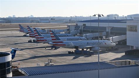 American Airlines Charlotte hub aircraft lineup and busy CLT departure gates