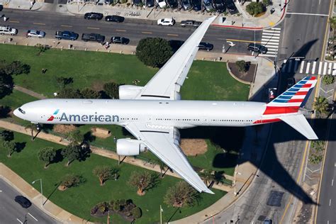 american airlines crew on board boeing 777 after passenger removal